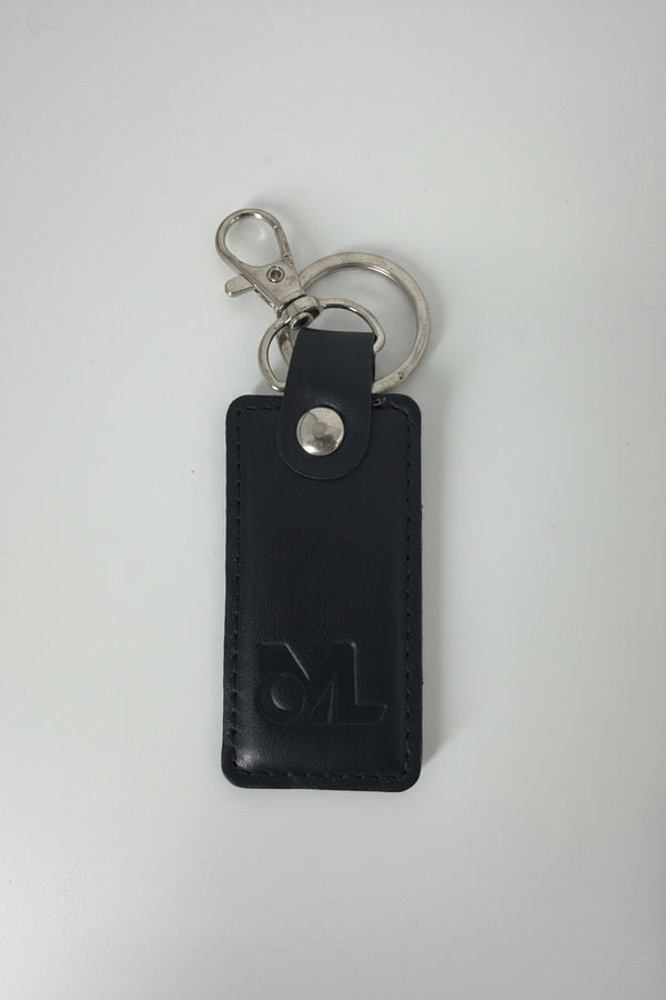 Rectangular leather keychain shown in an alternate color option