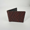 Patterned genuine leather bifold wallet in a clean premium product presentation