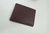 Classic brown leather bifold wallet in a clean premium product presentation