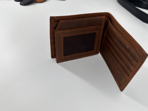 Crazy horse leather bifold wallet in a clean premium product presentation