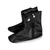 Pair of black leather shoe covers with side zipper and snap closure on white background