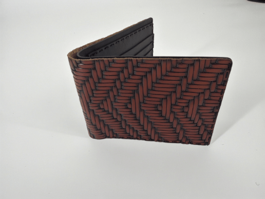 Patterned genuine leather bifold wallet in a clean premium product presentation